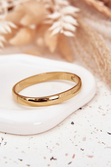 Una pulsera de acero inoxidable color dorado 2