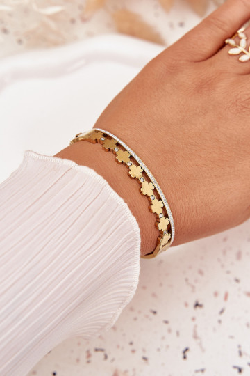 Pulsera de acero inoxidable color oro adornada con circonitas
