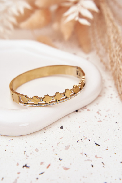 Una pulsera de acero inoxidable Ozdobiona Cyrkoniami color dorado