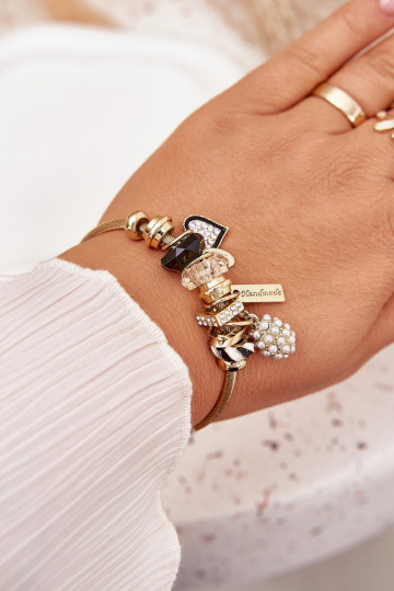 Una pulsera z ZaAieszkami Charms color dorado