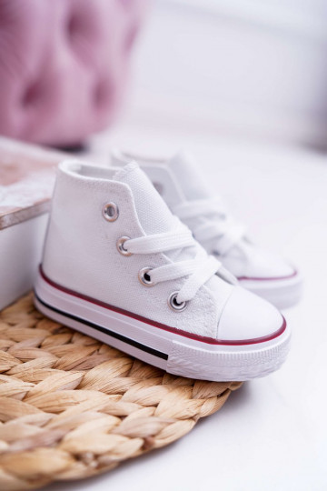 Zapatos infantiles con suela. el color blanco Filemon