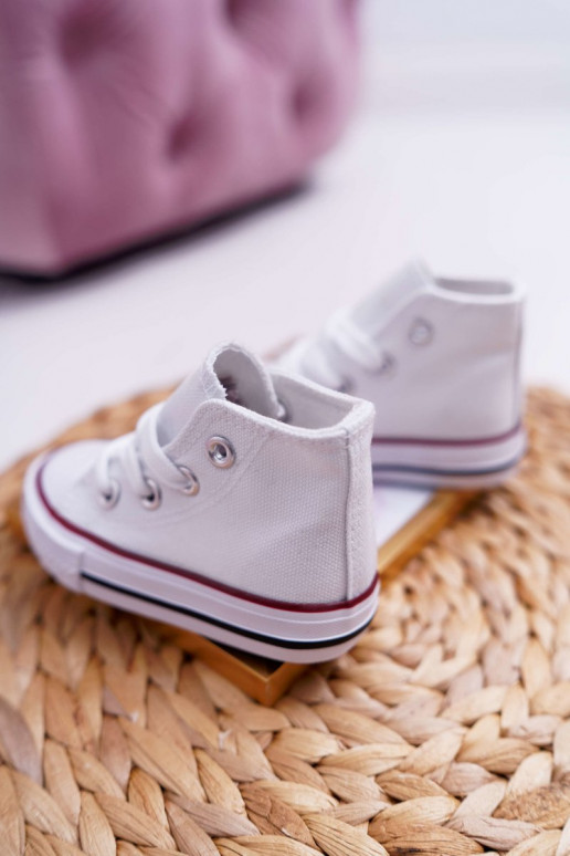 Zapatos infantiles con suela. el color blanco Filemon