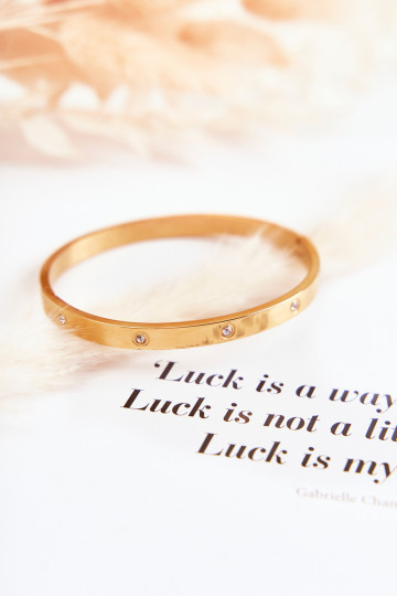 Pulsera de acero con ojales de circonio color dorado Lauren