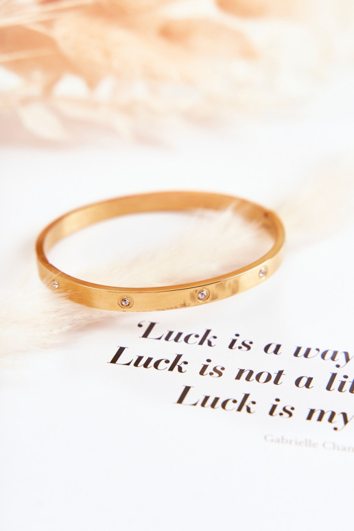 Pulsera de acero con ojales de circonio color dorado Lauren