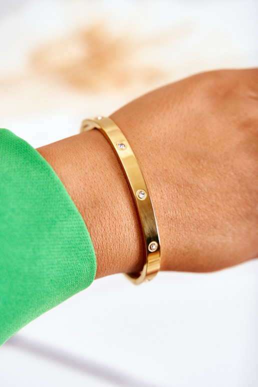 Pulsera de acero con ojales de circonio color dorado Lauren