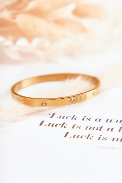 Pulsera de acero con ojales de circonio color dorado Lauren