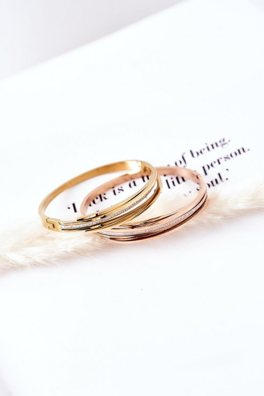 Pulsera de acero con ojos centelleantes color dorado