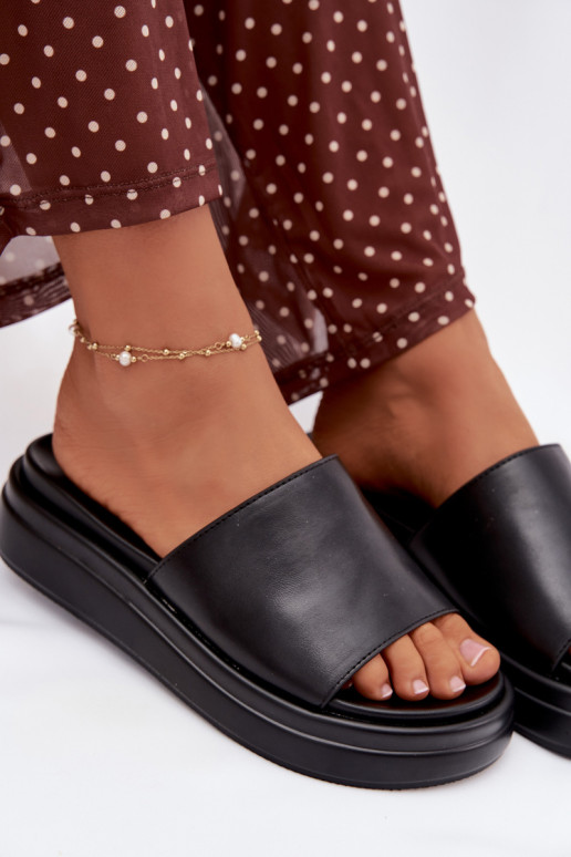 zapatillas de mujer con una plataforma de color negro Tanelisse