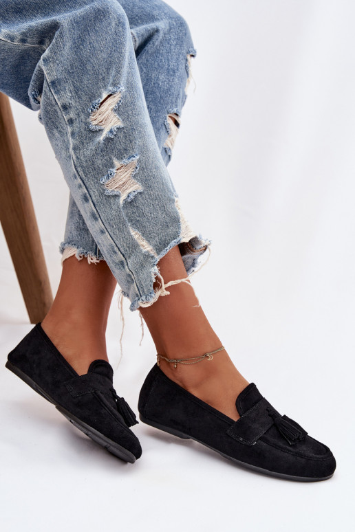 Mocasines apartamento de mujeres con flecos de color negro Tiene querilisse