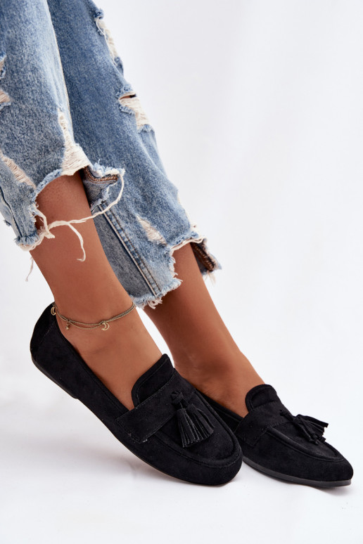 Mocasines apartamento de mujeres con flecos de color negro Tiene querilisse