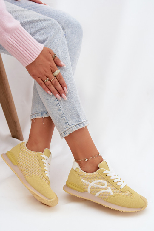 Zapatillas modelo zapatos. zapatillas Femenino color amarillo Tarlisse