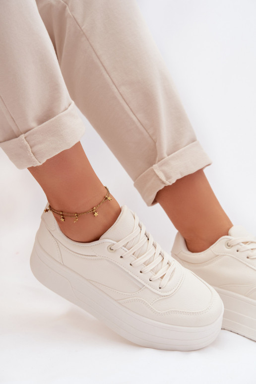 Zapatillas modelo zapatos. Femenino con una plataforma color marfil Feressa