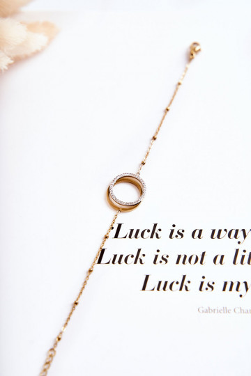 Femenino Elegante Una pulsera con hermosos detalles y circonitas color dorado