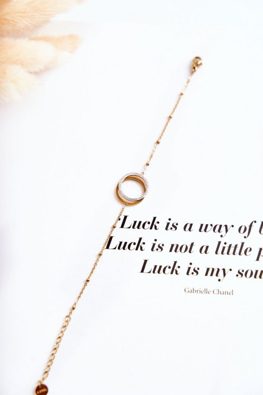 Femenino Elegante Una pulsera con hermosos detalles y circonitas color dorado