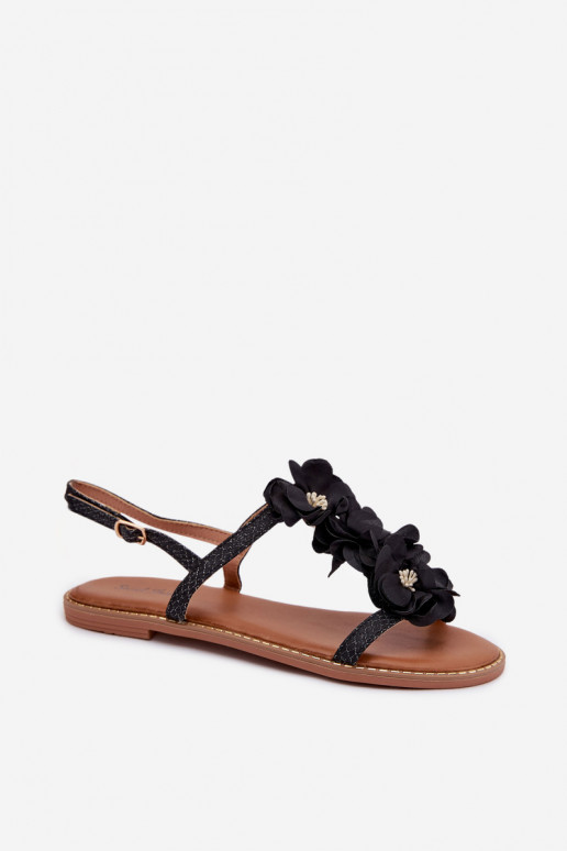 Sandalias planas para mujer. Con decoracionesi con motivos floraleskami de color negro Noemia