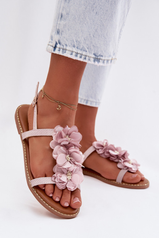 Sandalias planas para mujer. Con decoracionesi con motivos floraleskami color violeta Noemia