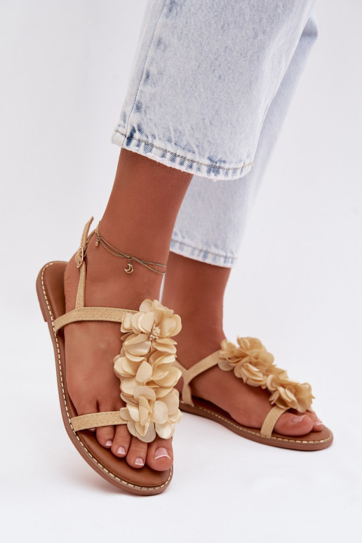 Sandalias planas para mujer. Con decoracionesi con motivos floraleskami color dorado Noemia