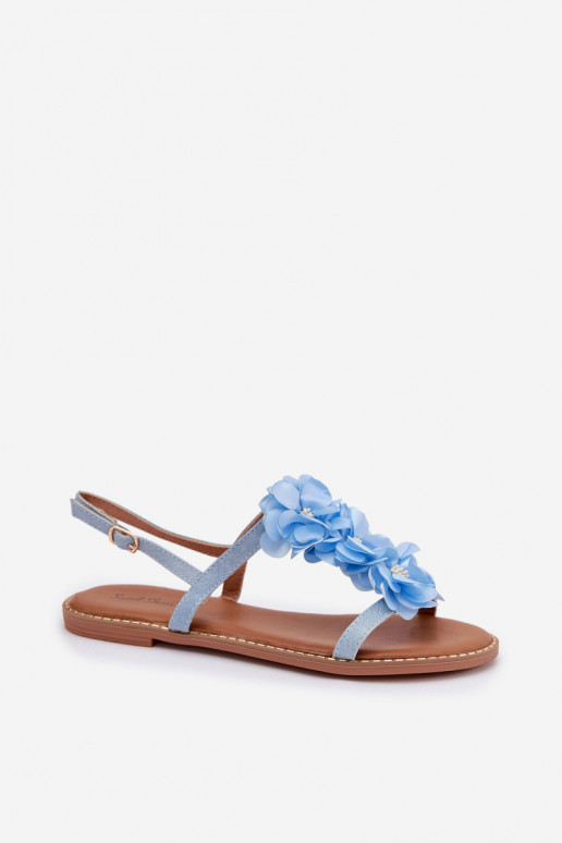 Sandalias planas para mujer. Con decoracionesi con motivos floraleskami color azul Noemia