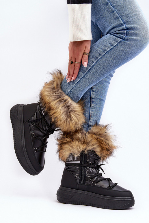 Botas de nieve Femenino con un abrigo de piel con una plataforma de color negro Activadobilla