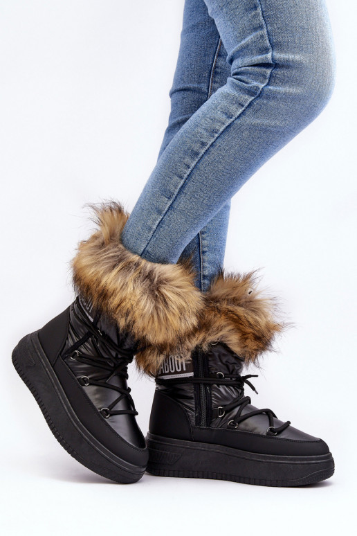 Botas de nieve Femenino con un abrigo de piel con una plataforma de color negro Activadobilla