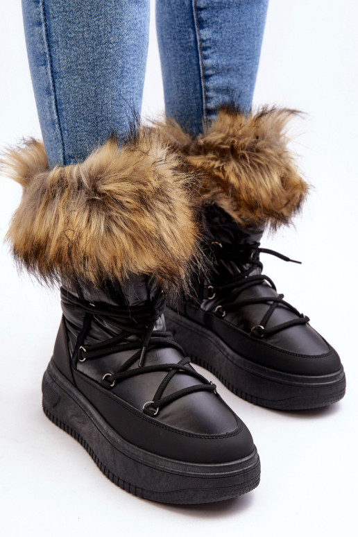 Botas de nieve Femenino con un abrigo de piel con una plataforma de color negro Activadobilla