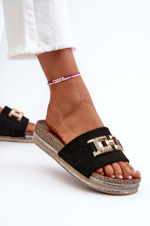 Zapatillas de mujer con plataforma y adorno. de color negro Vapireta