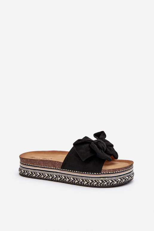 zapatillas de mujer con una plataforma con cintas de color negro Evatria