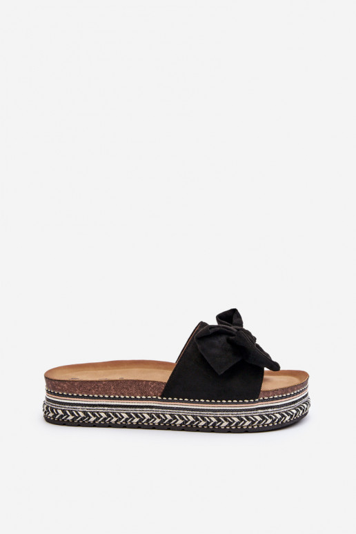 zapatillas de mujer con una plataforma con cintas de color negro Evatria