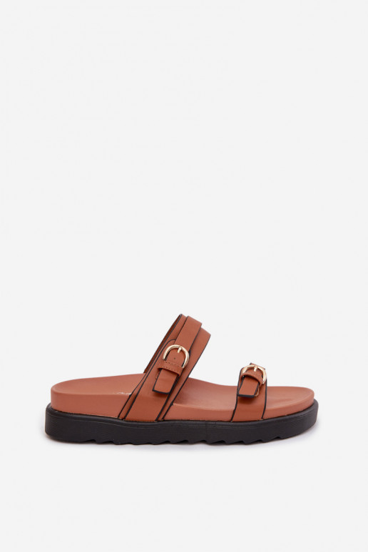 zapatillas de mujer con una plataforma con rayas I color doradomi con hebillasmi color marrón Rirea