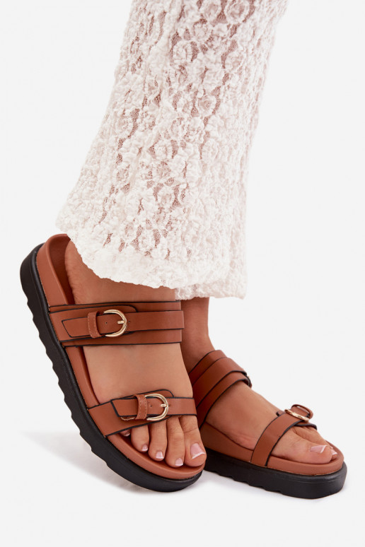 zapatillas de mujer con una plataforma con rayas I color doradomi con hebillasmi color marrón Rirea