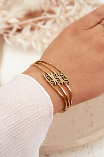 Femenino Una pulsera de acero inoxidable color dorado