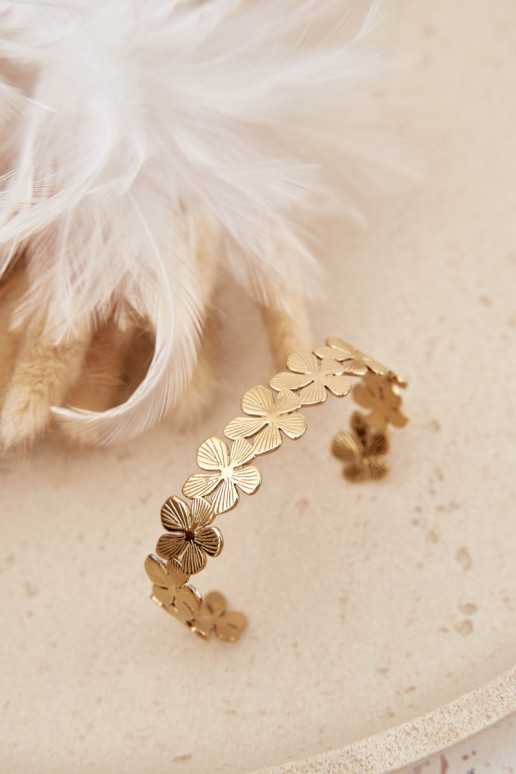 Una pulsera Femenino de acero inoxidable con flores color dorado