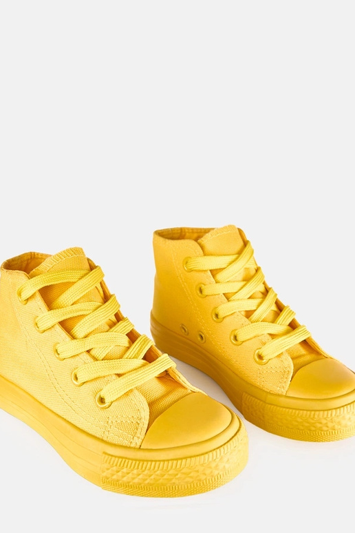 Zapatillas deportivas altas amarillas...