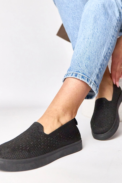 Zapatillas deportivas de tela negras...