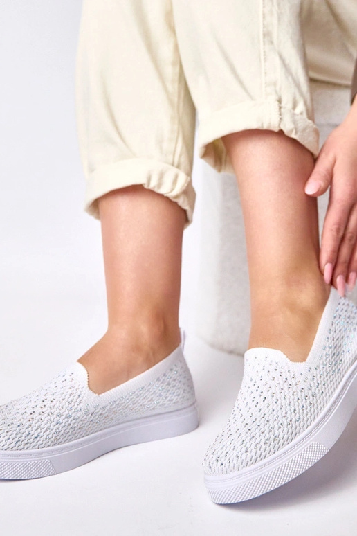 Zapatillas deportivas de tela blancas...