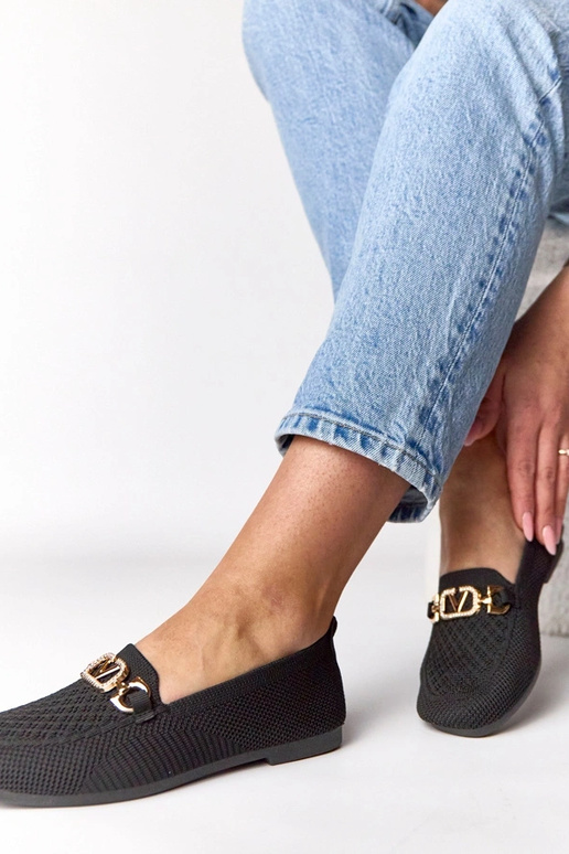 Mocasines de tela negros con adorno...