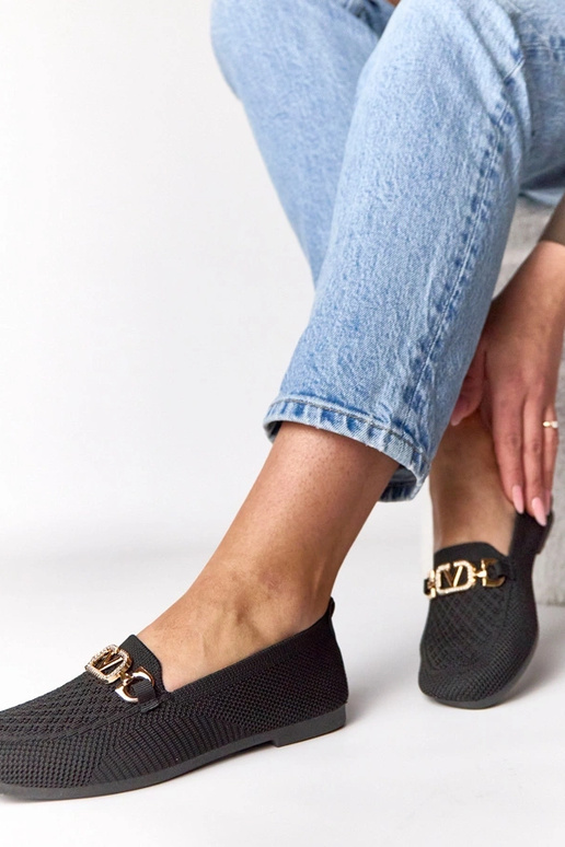 Mocasines de tela negros con adorno...