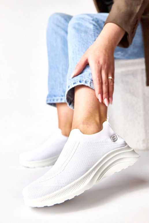 Zapatillas deportivas de tela blancas...