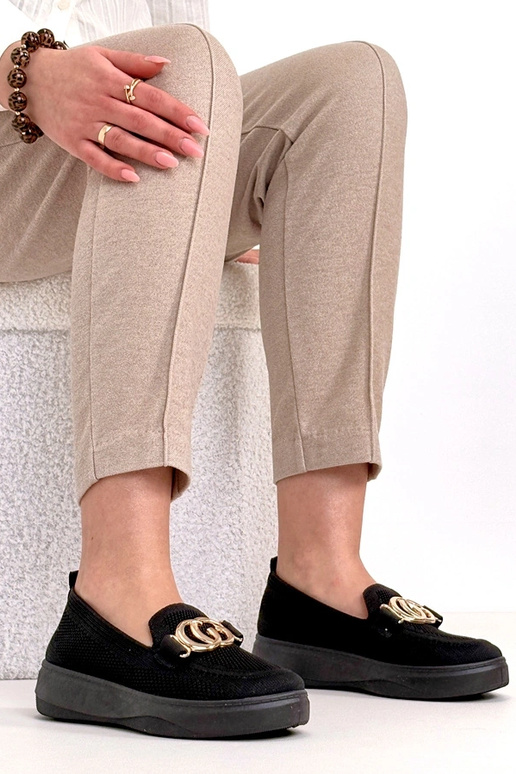 Zapatillas deportivas de tela negras...