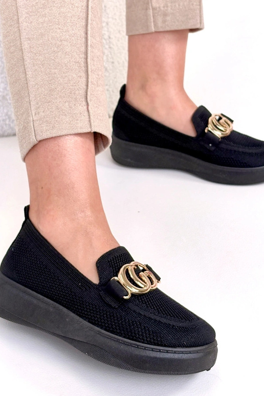 Zapatillas deportivas de tela negras...