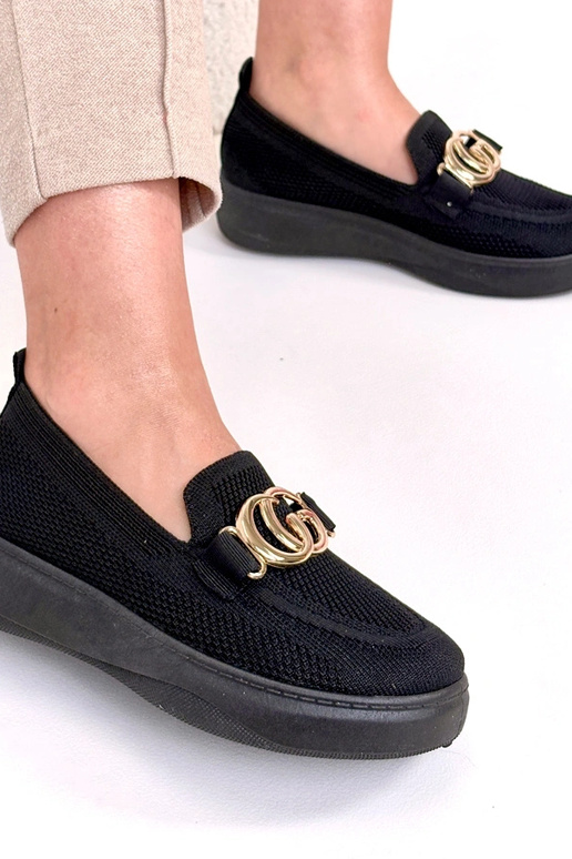 Zapatillas deportivas de tela negras...