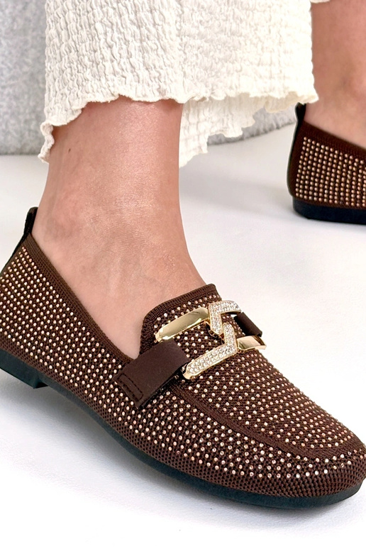 Mocasines en tono chocolate decorados...