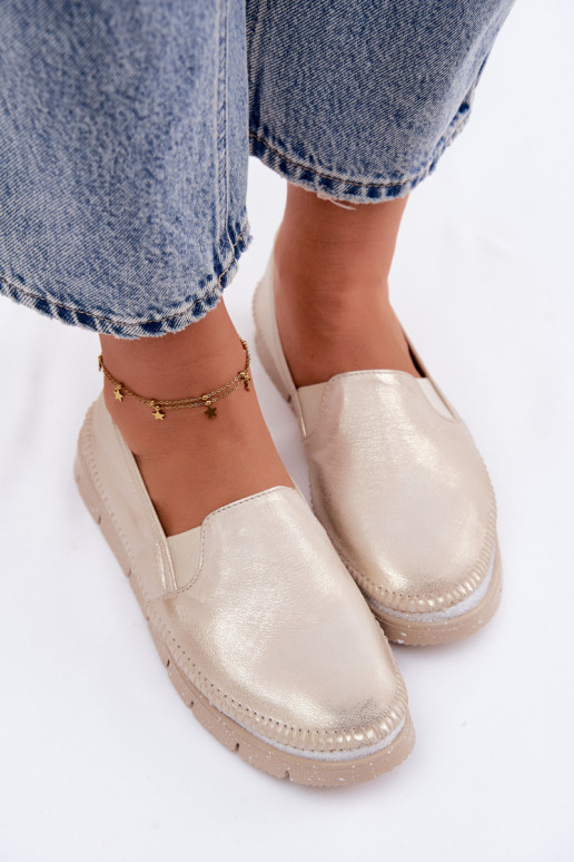 Zapatos de mujer dorados tipo slip-on de cuero Przecierany