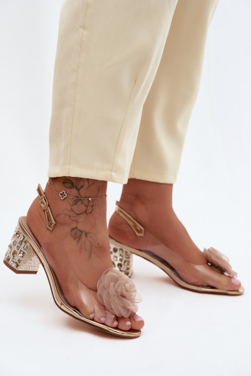 Sandalias transparentes doradas con tacones y tachuelas brillantes D&A