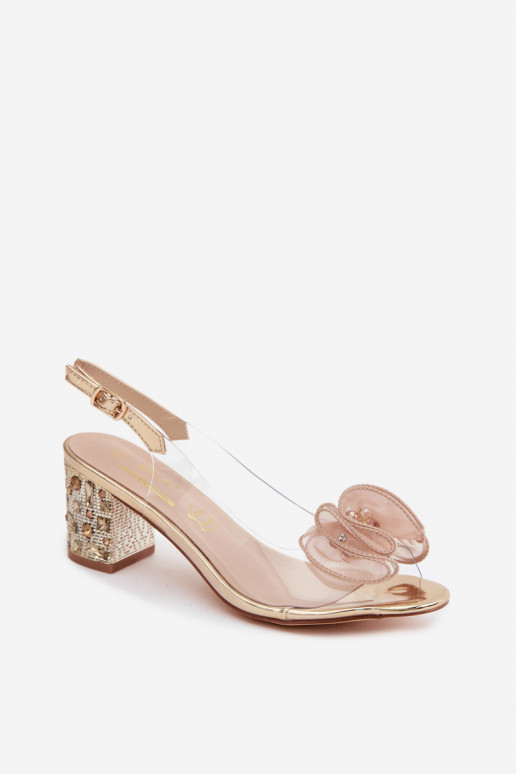 Sandalias transparentes con tacón y gemas brillantes en dorado