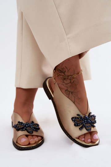 Sandalias brillantes con adornos en dorado plano Russona