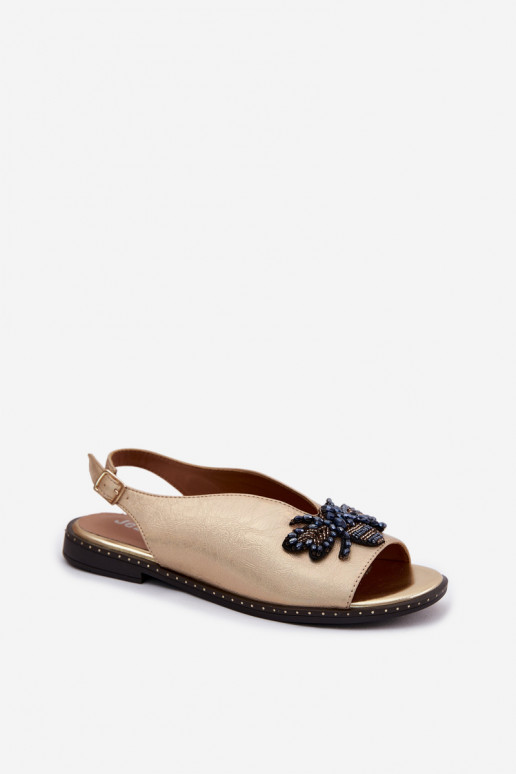 Sandalias brillantes con adornos en dorado plano Russona