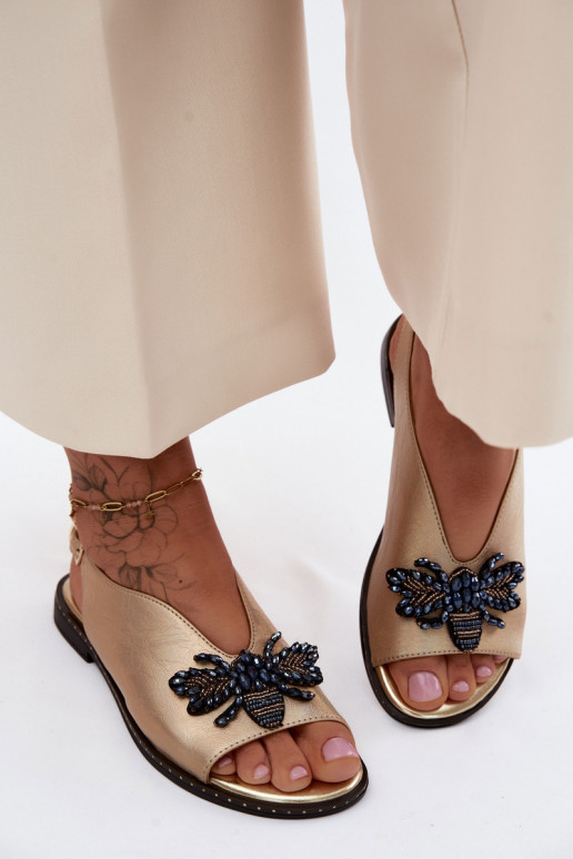 Sandalias brillantes con adornos en dorado plano Russona