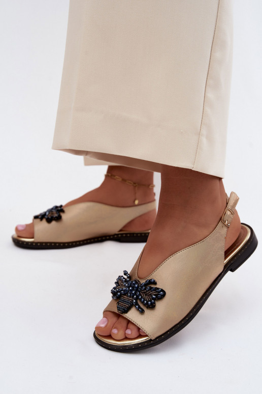 Sandalias brillantes con adornos en dorado plano Russona