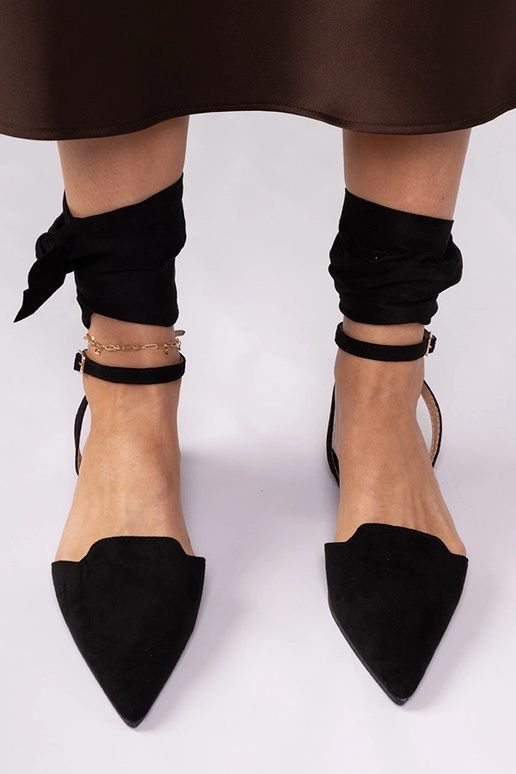 Mules negras de tacón plano Mella